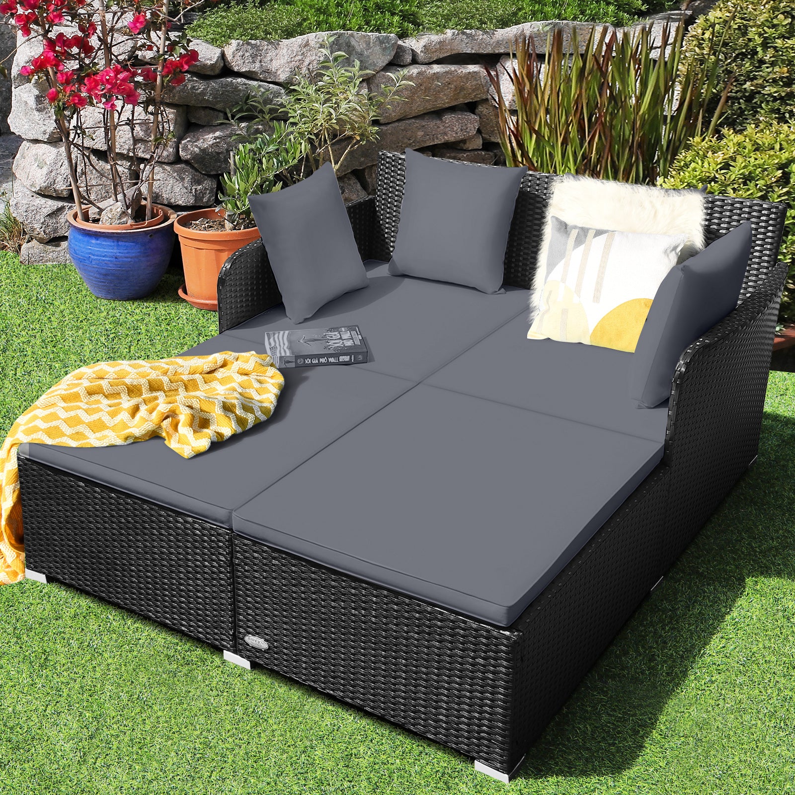 Spacious Outdoor Rattan Daybed with Upholstered Cushions and Pillows ...